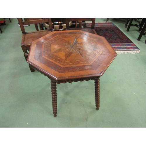 4127 - An early Victorian mixed wood veneered octagonal top lamp table on bobbin turned leg supports, 67cm ... 