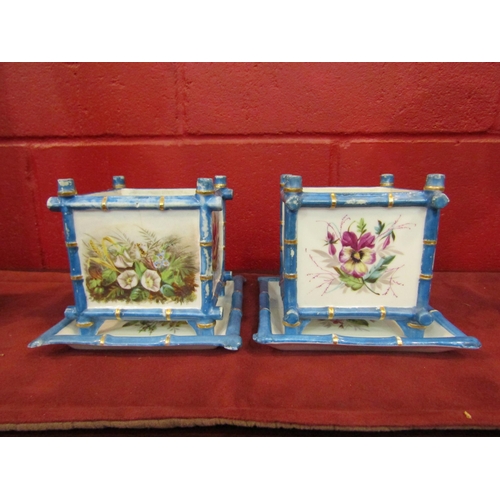 4189 - A pair of early 20th Century porcelain plant pots with trays, bamboo effect