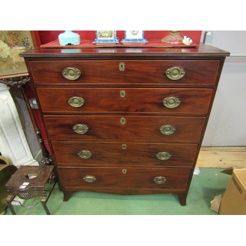 4190 - A George III mahogany chest the reeded edge top over five graduating long drawers on outswept bracke... 