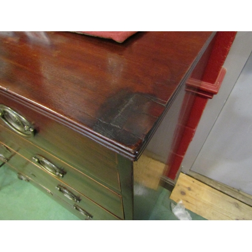 4190 - A George III mahogany chest the reeded edge top over five graduating long drawers on outswept bracke... 