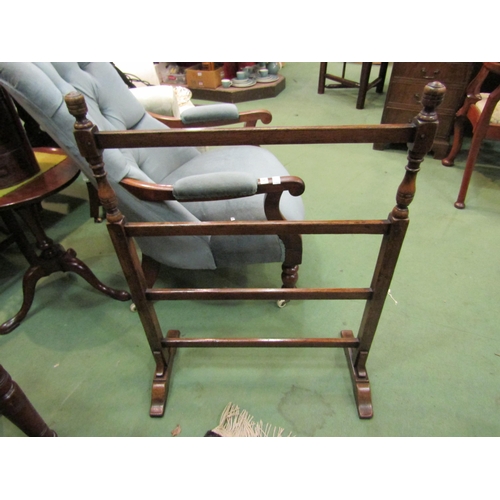 4208 - A Titchmarsh & Goodwin 17th Century style pegged oak four bar towel rail on turned and square suppor... 