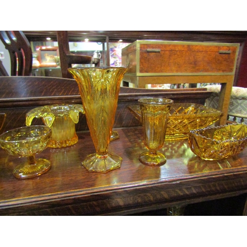 4234 - A selection of Art Deco amber coloured glassware including vases and bowls