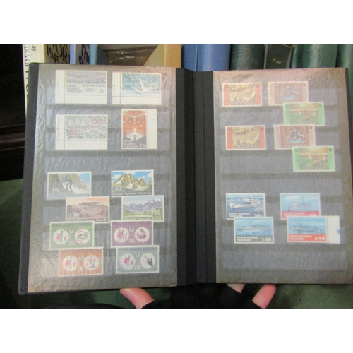 4238 - A box containing approximately 11 albums of British and World stamps mostly dating from mid to late ... 