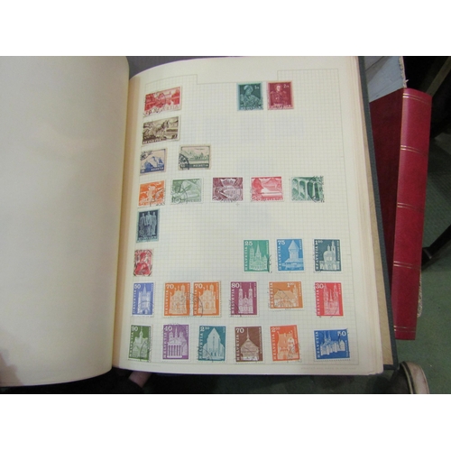 4238 - A box containing approximately 11 albums of British and World stamps mostly dating from mid to late ... 