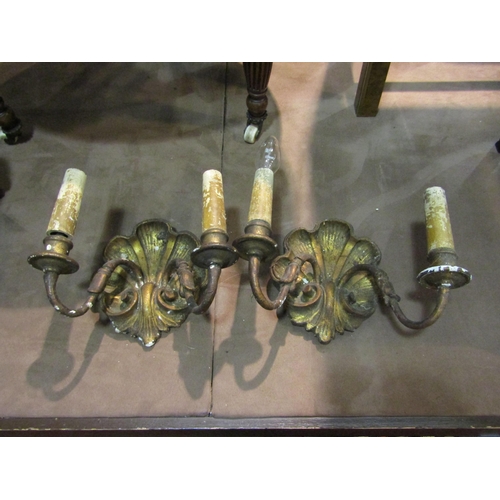 4253 - A pair of gilt Rococo style wall candle light twin arm sconces   (R)  £30