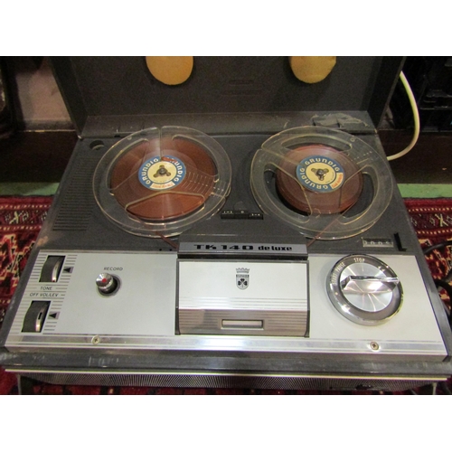 4263 - A Grundig TK140 DeLuxe reel to reel tape recorder and a boxed Bell & Howell cine projector (2)   (E)... 