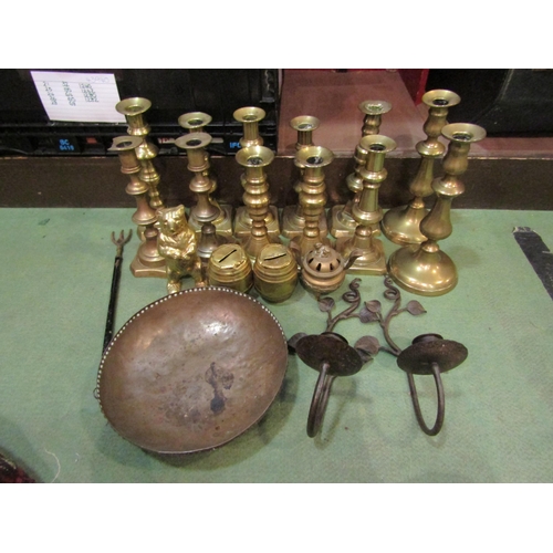 4265 - A box containing a quantity of brassware, mostly candlesticks and a copper bowl etc