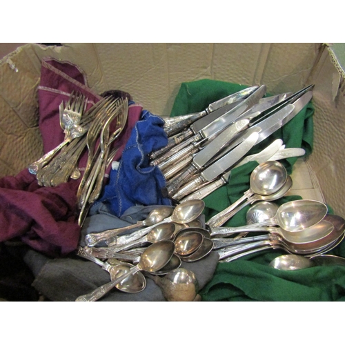 4268 - A box containing a quantity of EPNS Kings pattern cutlery, two graduated ornate plated dishes and a ... 