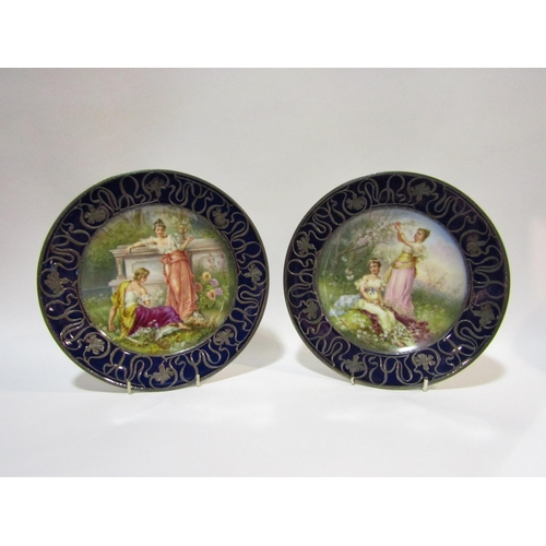 4279 - A pair of decorative Vienna wall plates including 