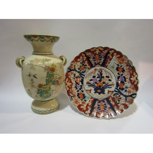 4302 - A Japanese Imari pattern charger with scalloped edge, heavily repaired, and an Oriental vase with bi... 