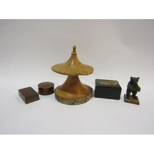 4320 - Five items of treen, including turned wood hat pin stand, small Black Forest bear, three small boxes... 