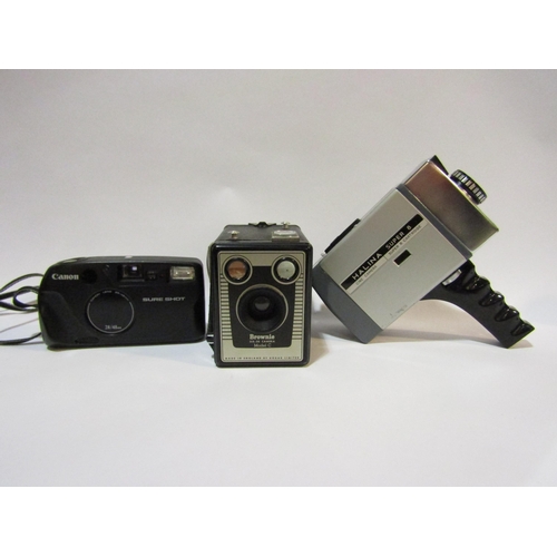 4343 - A late Box Brownie Model C camera, circa 1960's in case. An Halina Super 8 cine camera, cased. A Can... 