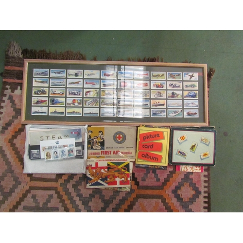 4007 - A framed display of Will’s cigarette cards together with a quantity of tea card booklets and mint st... 