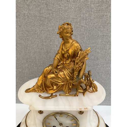 7004 - A 19th Century French 8 day mantel clock with ormolu Demeter figural top, alabaster with brass bandi... 