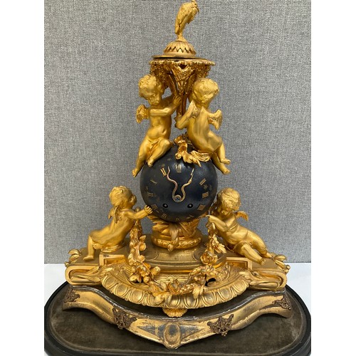 7014 - A French ormolu figural mantel clock of globe form with Olivant & Botsford of Paris movement, highly... 