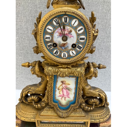 7025 - A 19th Century ormolu and Sevres style panel figural mantel clock with merman style mounts, on gilt ... 