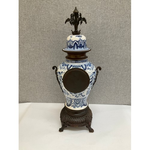 7027 - A modern Dutch style vase form clock with Roman dial, 56cm tall x 23cm wide, with pendulum