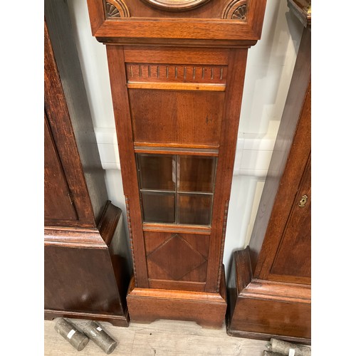 7033 - An Art Deco German three train long case clock with Arabic dial, oak case, rear of inner case marked... 