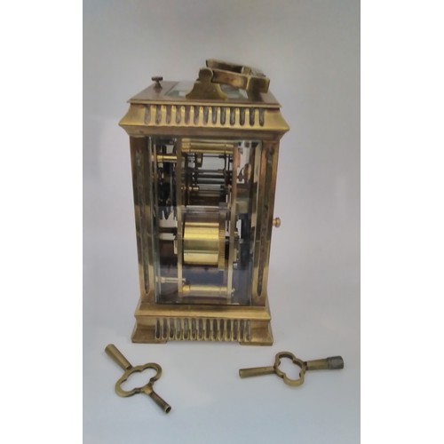 7315 - A late 19th / early 20th Century brass cased carriage clock with striking and repeating mechanism, d... 