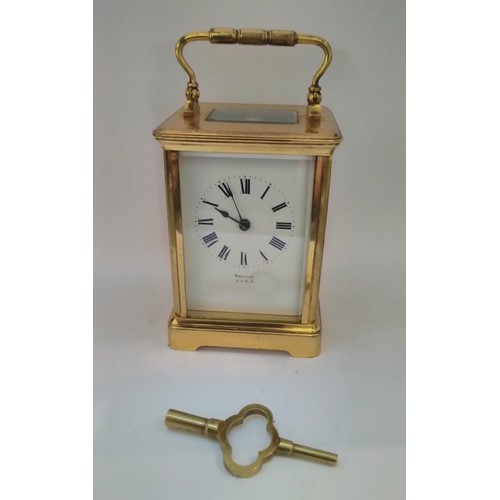 7318 - A Brevete S.G.D.G. French dual time carriage clock, brass cased, with travel case