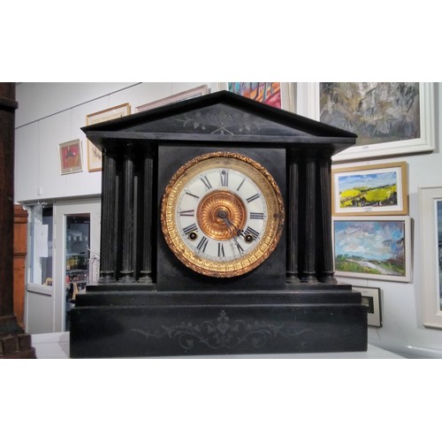 7278 - A Victorian black slate mantel clock of architectural form, gilt brass surround