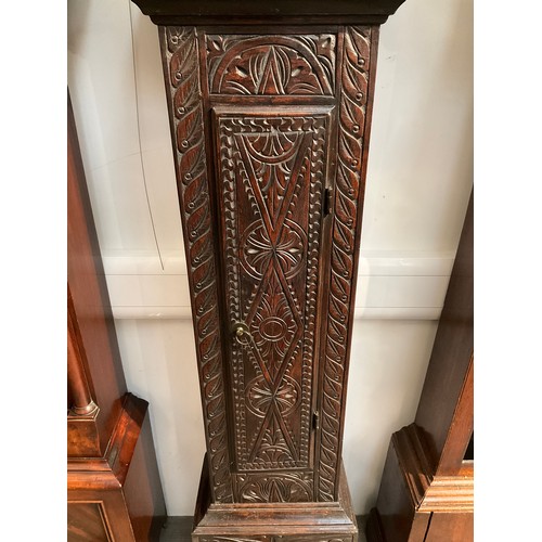 7101 - A Daniel Daulton of Church Lawford long case clock with heavily carved possibly later oak case, gilt... 