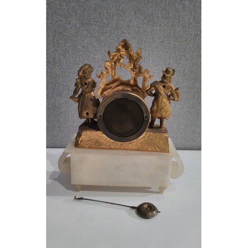 7293 - A late 19th Century French ormolu and alabaster mantel clock with musician and flower girl, swag det... 