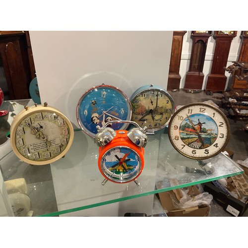 7221 - Five mid century pictorial alarm clocks including pandas, Smiths hare and tortoise and Trafalgar Squ... 