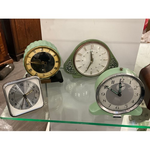 7225 - Four Art Deco style alarm clocks including Metamec