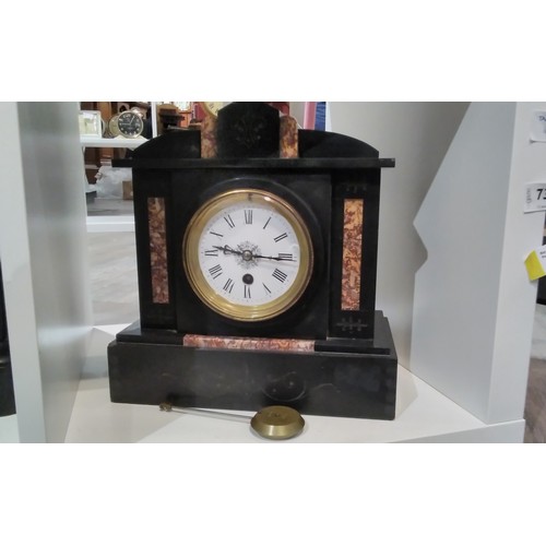 7307 - A circa 1900 black slate and marble mantel clock with Roman dial, architectural form, with pendulum