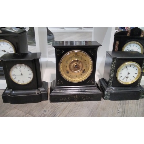 7306 - Three circa 1900 mantel clocks, two black slate, the other ebonised