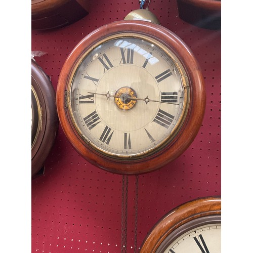 7064 - A Victorian postman's alarm clock with 9'' dial, Roman numerated, with pendulum and one weight