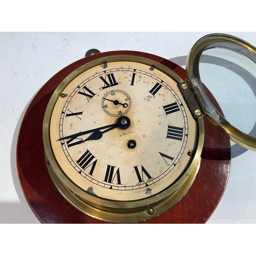 7246 - A brass cased ship's clock mounted on hardwood plaque   (E)  £35-45