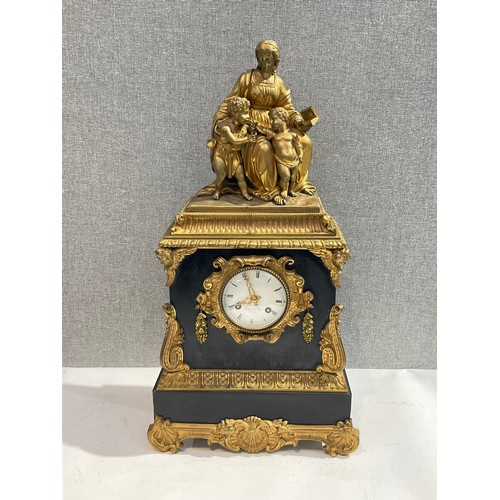 7248 - A 19th Century French ormolu and black marble mantel clock, silk suspension, figural scene to top