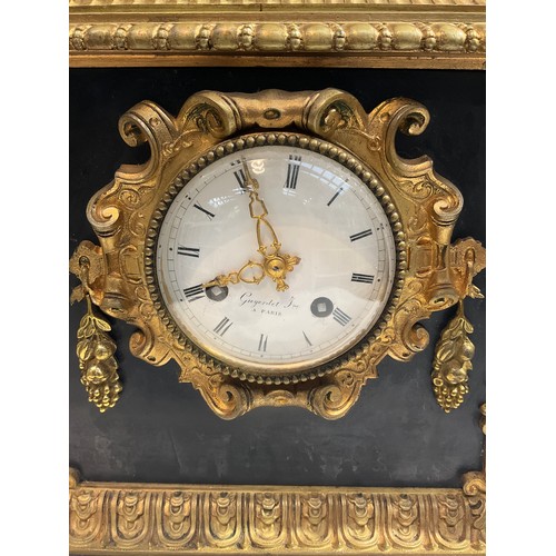 7248 - A 19th Century French ormolu and black marble mantel clock, silk suspension, figural scene to top