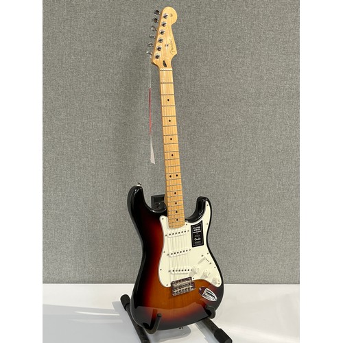 5103 - A Fender Player Series Stratocaster electric guitar Made in Mexico, with three tone sunburst body, m... 