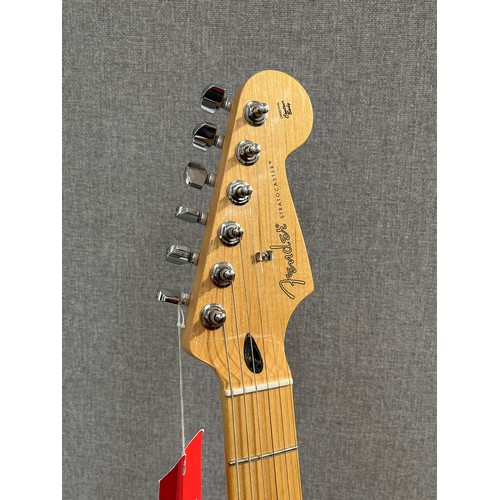 5103 - A Fender Player Series Stratocaster electric guitar Made in Mexico, with three tone sunburst body, m... 