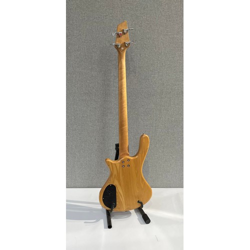 5098 - A Washburn Taurus T14 electric bass guitar, natural body