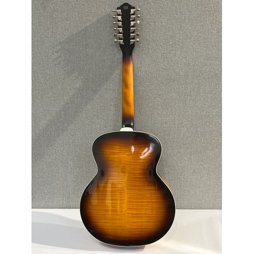 5116 - A Guild F-2512E Deluxe Westerly 12 string electro acoustic guitar with antique sunburst body, tortoi... 