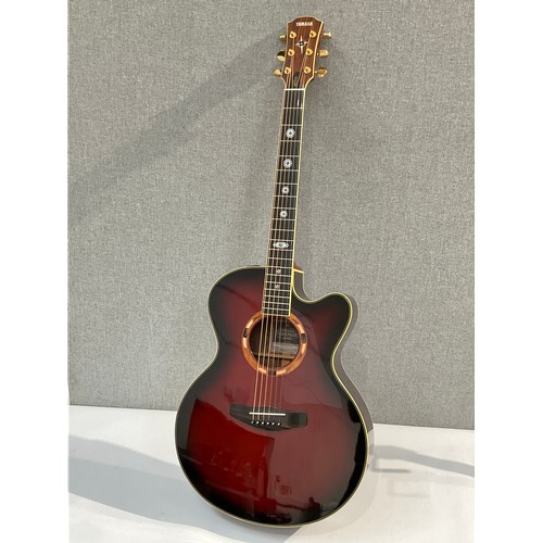 5110 - A Yamaha Compass Series CPX-15WA electro acoustic guitar, redburst body, inlaid sound hole surround,... 