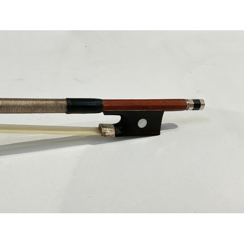 5091 - A French Francois Lotte violin bow with nickel and mother of pearl set ebony frog, round stick, ivor... 