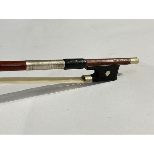 5087 - A Gustavia Rudolf Steinel violin bow with nickel and mother of pearl set ebony frog, round stick, iv... 