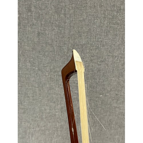 5087 - A Gustavia Rudolf Steinel violin bow with nickel and mother of pearl set ebony frog, round stick, iv... 