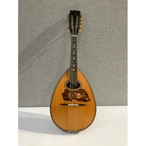 5112 - A Louis Patenotte teardrop form mandolin with marquetry rose pickguard, inlaid surround