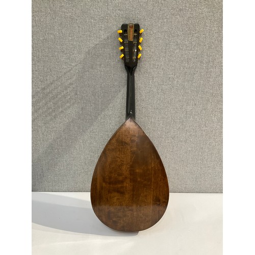 5112 - A Louis Patenotte teardrop form mandolin with marquetry rose pickguard, inlaid surround