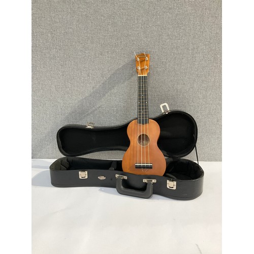 5100 - A Mahalo ukulele of guitar form with fitted hard case