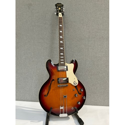 5114 - An Epiphone Riviera VC semi-acoustic electric guitar, sunburst body, hole to reverse and some splitt... 