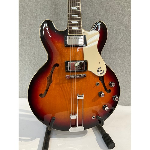 5114 - An Epiphone Riviera VC semi-acoustic electric guitar, sunburst body, hole to reverse and some splitt... 