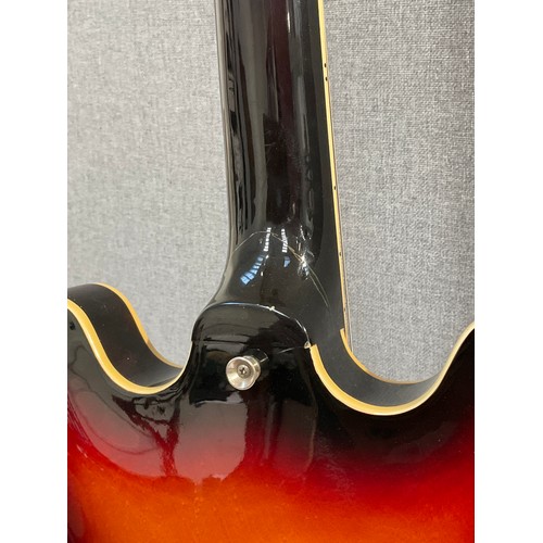 5114 - An Epiphone Riviera VC semi-acoustic electric guitar, sunburst body, hole to reverse and some splitt... 