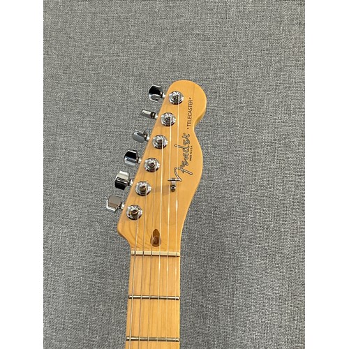 5106 - A Fender American Series Telecaster in natural ash, serial number Z1032582, maple neck, Fender hard ... 